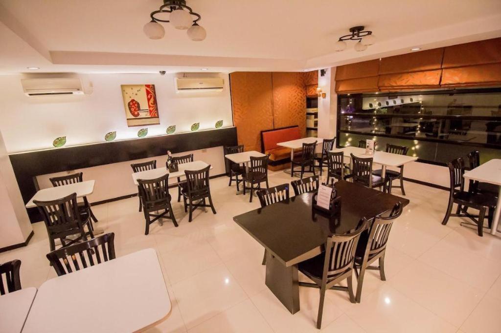 The Red Palm Suites And Restaurant Butuan City Экстерьер фото