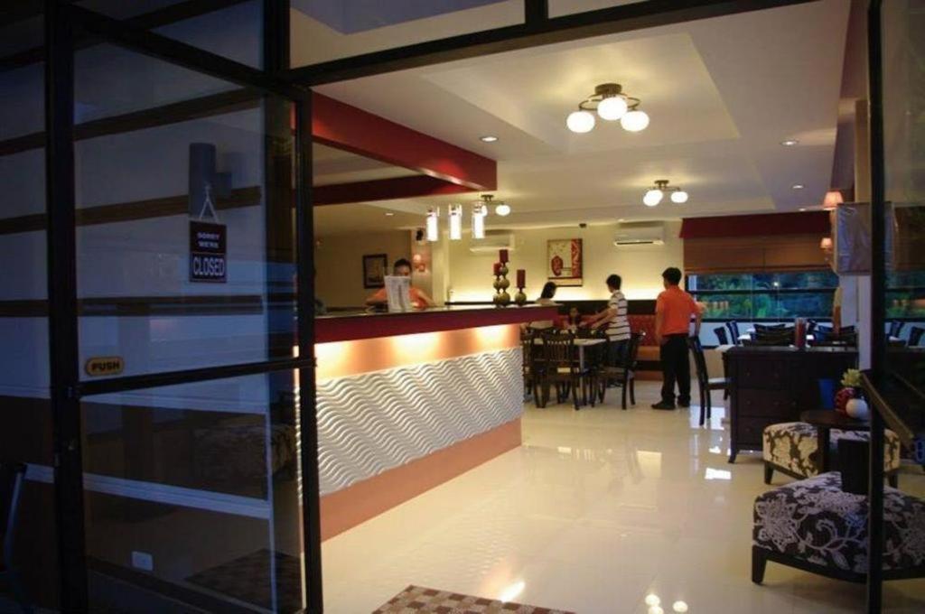 The Red Palm Suites And Restaurant Butuan City Экстерьер фото