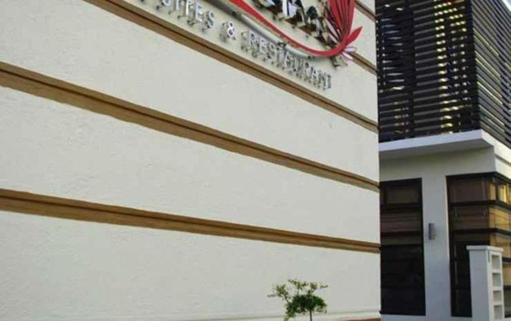 The Red Palm Suites And Restaurant Butuan City Экстерьер фото