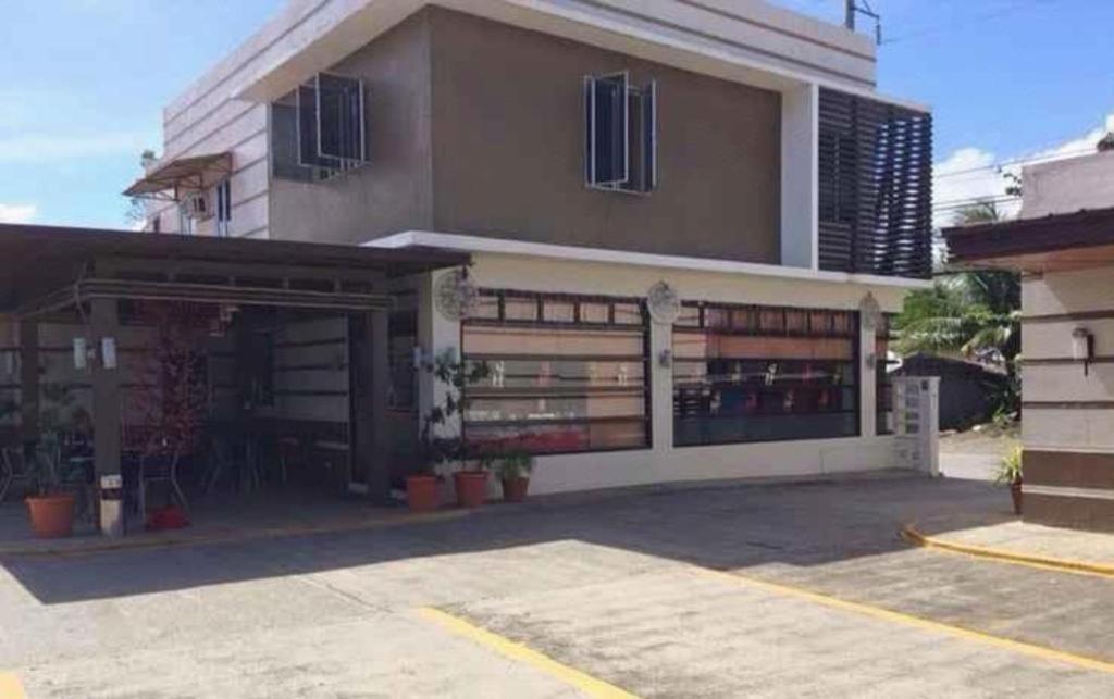 The Red Palm Suites And Restaurant Butuan City Экстерьер фото